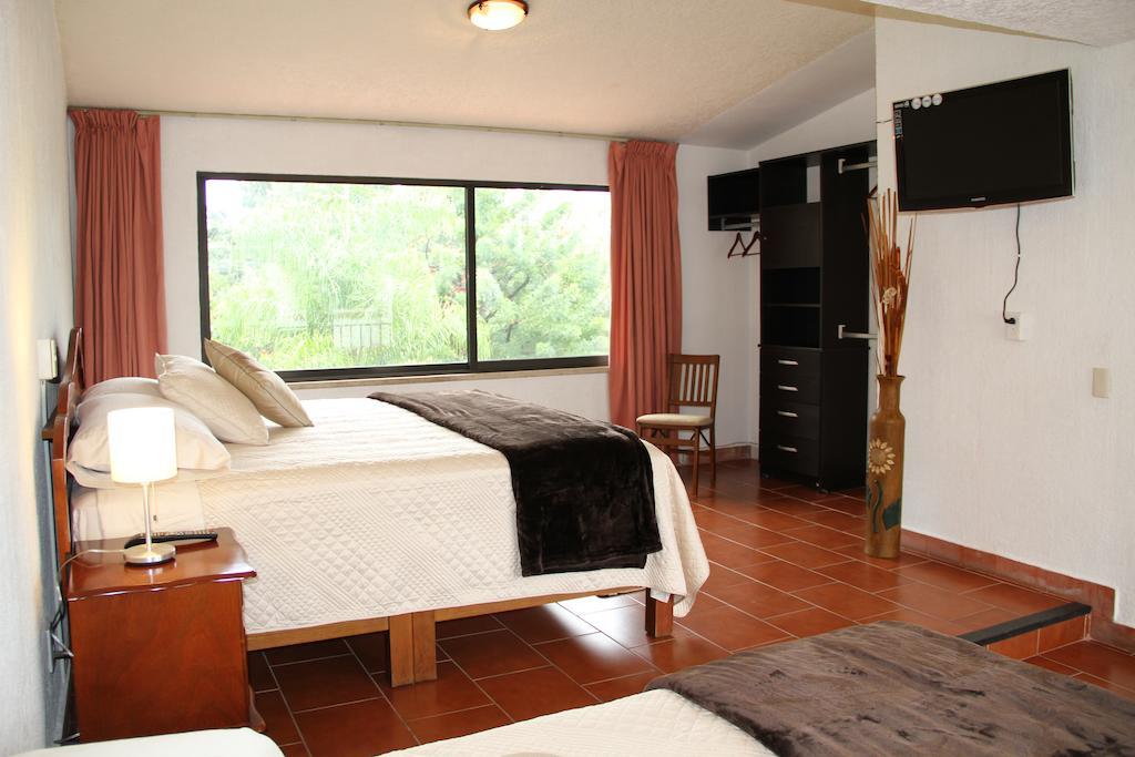Hotel Quinta Del Sol Тепоцтлан Стая снимка